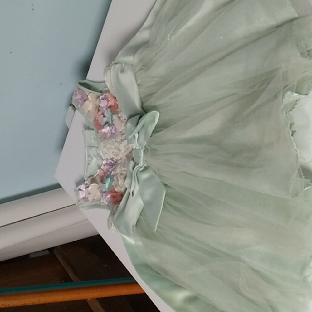 Rare editions 9 month size dress with free large size 14 to 20 pound swaddler